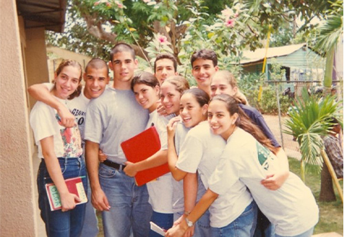 Gonzalez-Guarda in the DR as a teen with a group of other teenagers